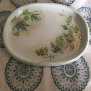 Vintage hand painted porcelain tray with added detail on edging. Signed RAYBORN.